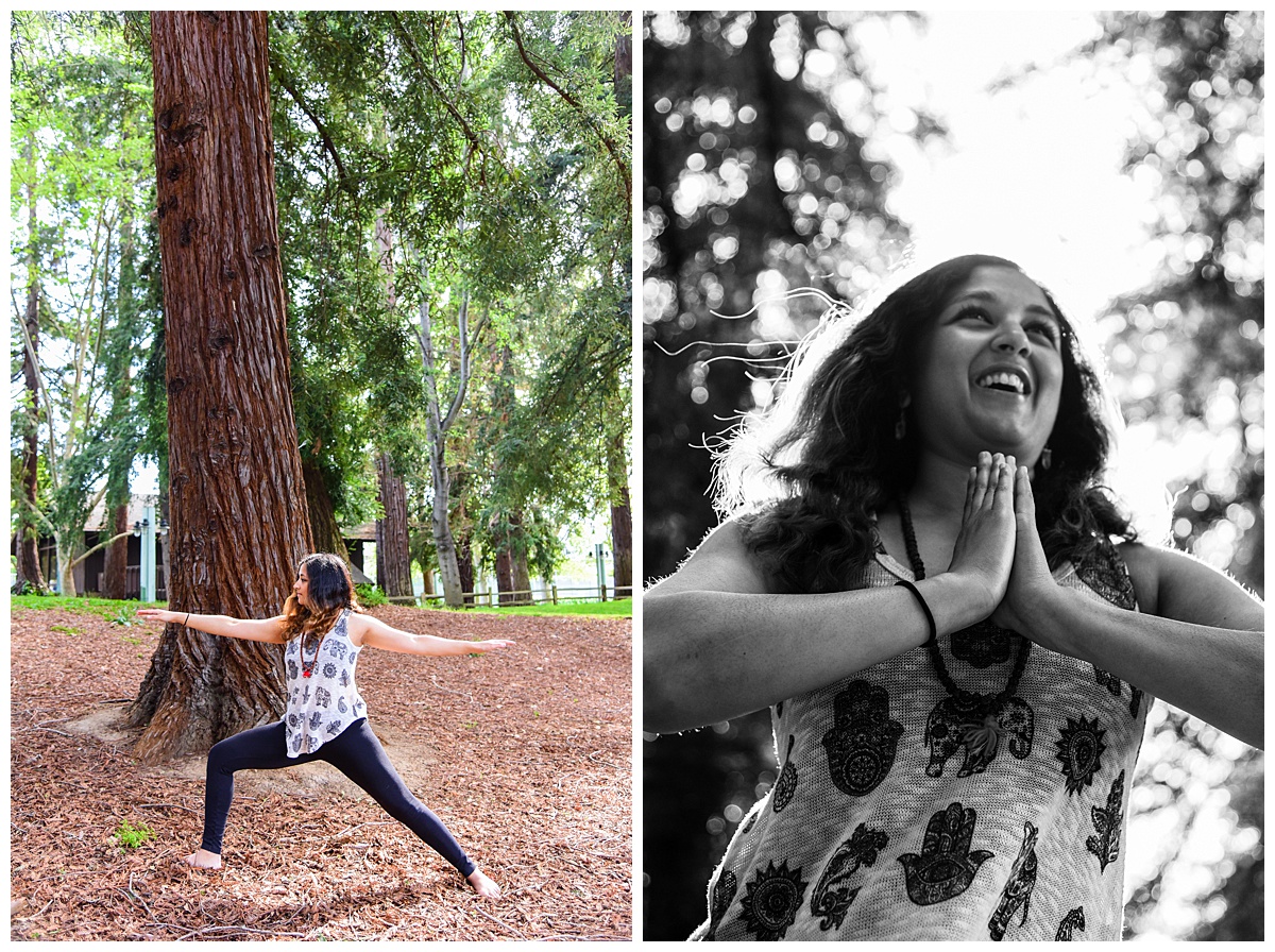 Woman doing yoga warrior pose and praying underneath redwood trees
