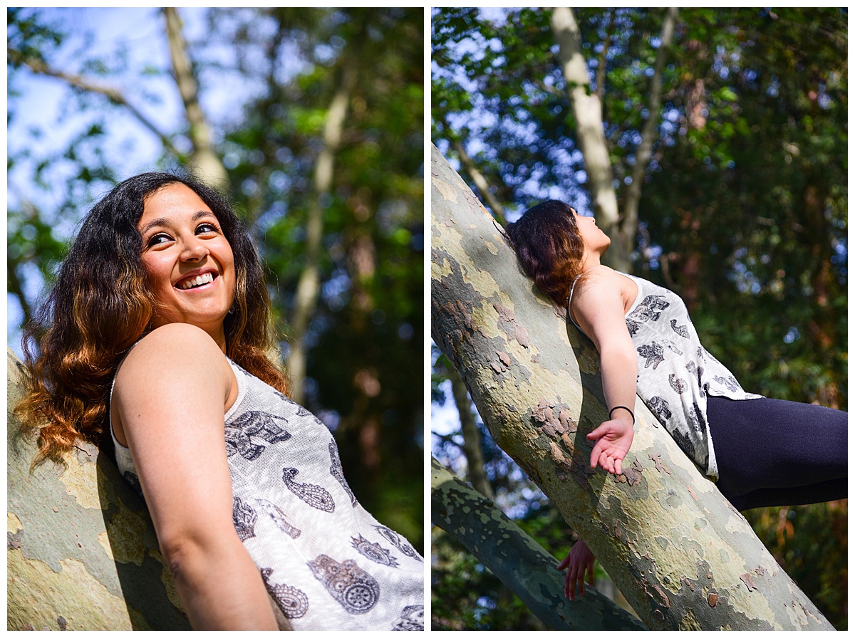 Yoga instructor stretching in a sycamore tree