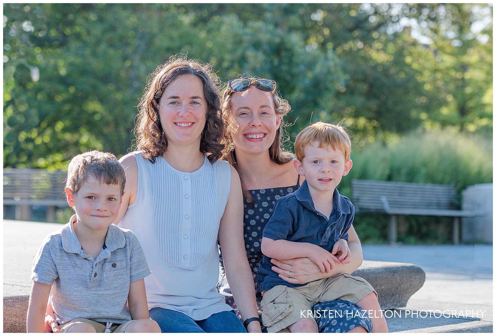 Two moms and their sons smiling for family photos at Scoville Park, Oak Park, IL