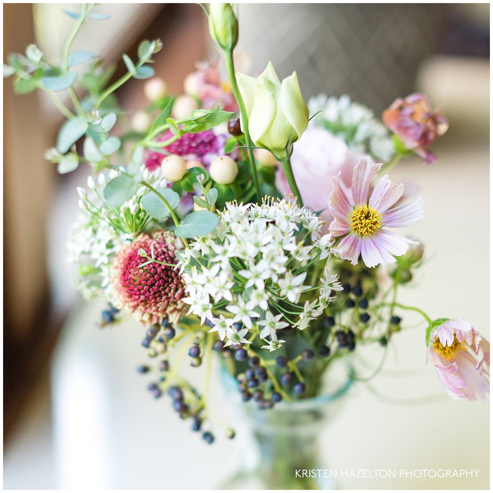 Late summer bouquet with pink cosmos and white allium flowers