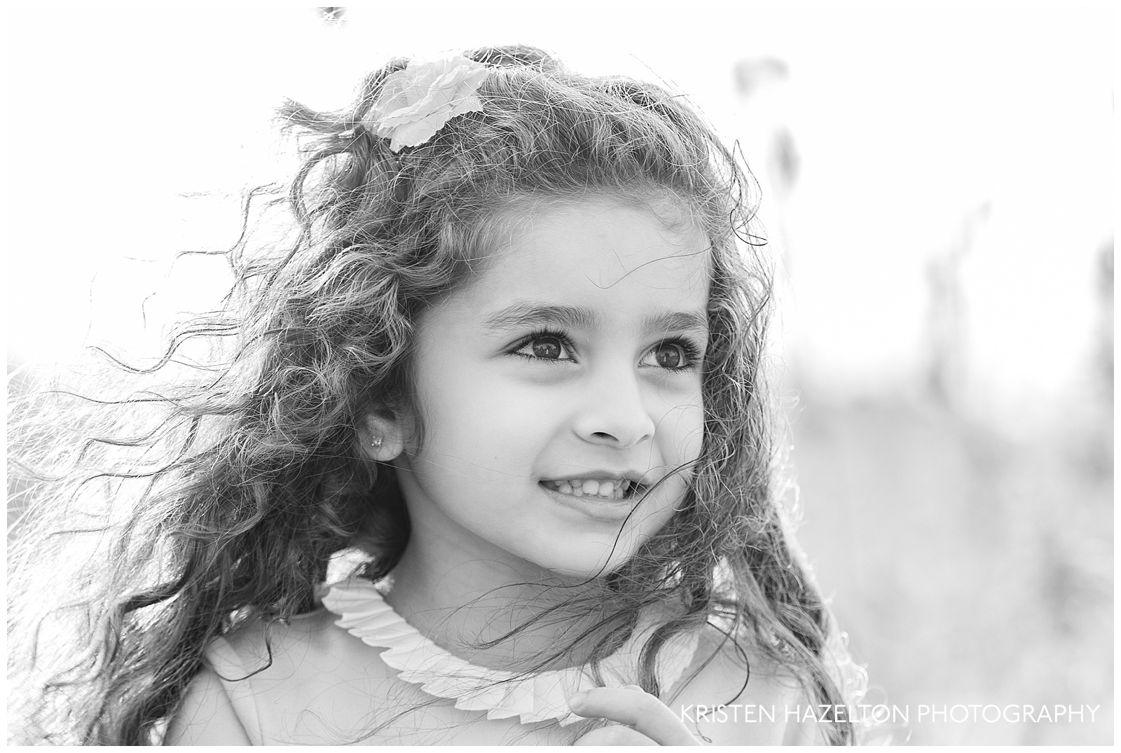Closeup black and white portrait of a young girl