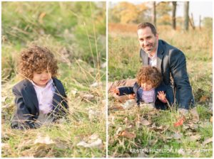 father playing with his baby son in a field