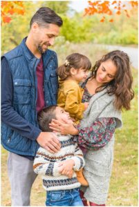 Fall portraits of a young family of four in Thatcher Woods in River Forest, IL