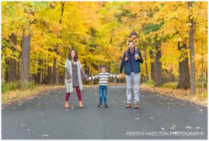 Fall portraits of a young family of four in Thatcher Woods in River Forest, IL