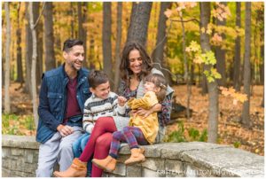 Fall portraits of a young family of four in Thatcher Woods in River Forest, IL
