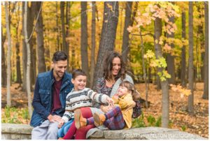 Fall portraits of a young family of four in Thatcher Woods in River Forest, IL