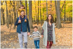 Fall portraits of a young family of four in Thatcher Woods in River Forest, IL