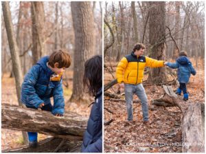 Family lifestyle portraits of a young family helping their toddler climb trees