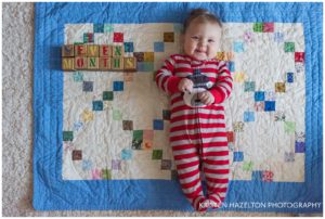 Seven month old baby with baby blocks