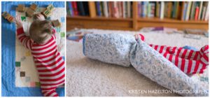 Baby playing with blocks and rolling up inside her quilt