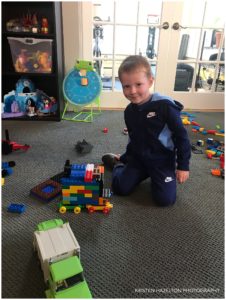 Little boy built a garbage truck out of duplos