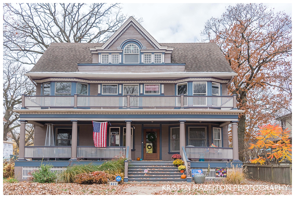 Blue victorian home in the fall in Oak Park, IL