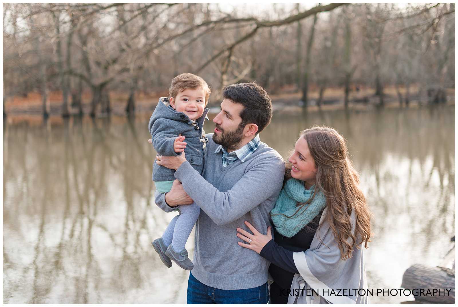 Family of three posing for family and maternity photos in River Forest, IL