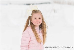 Smiling young girl in the snow