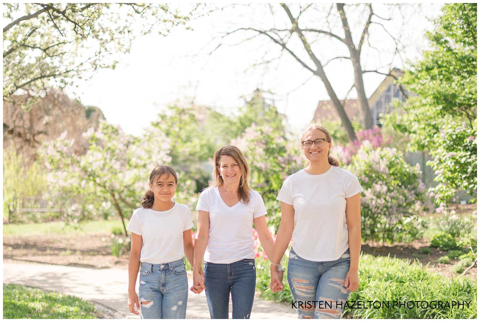 Mother with teenage daughters walking in Lilacia Park by Lombard, IL photographer Kristen Hazelton