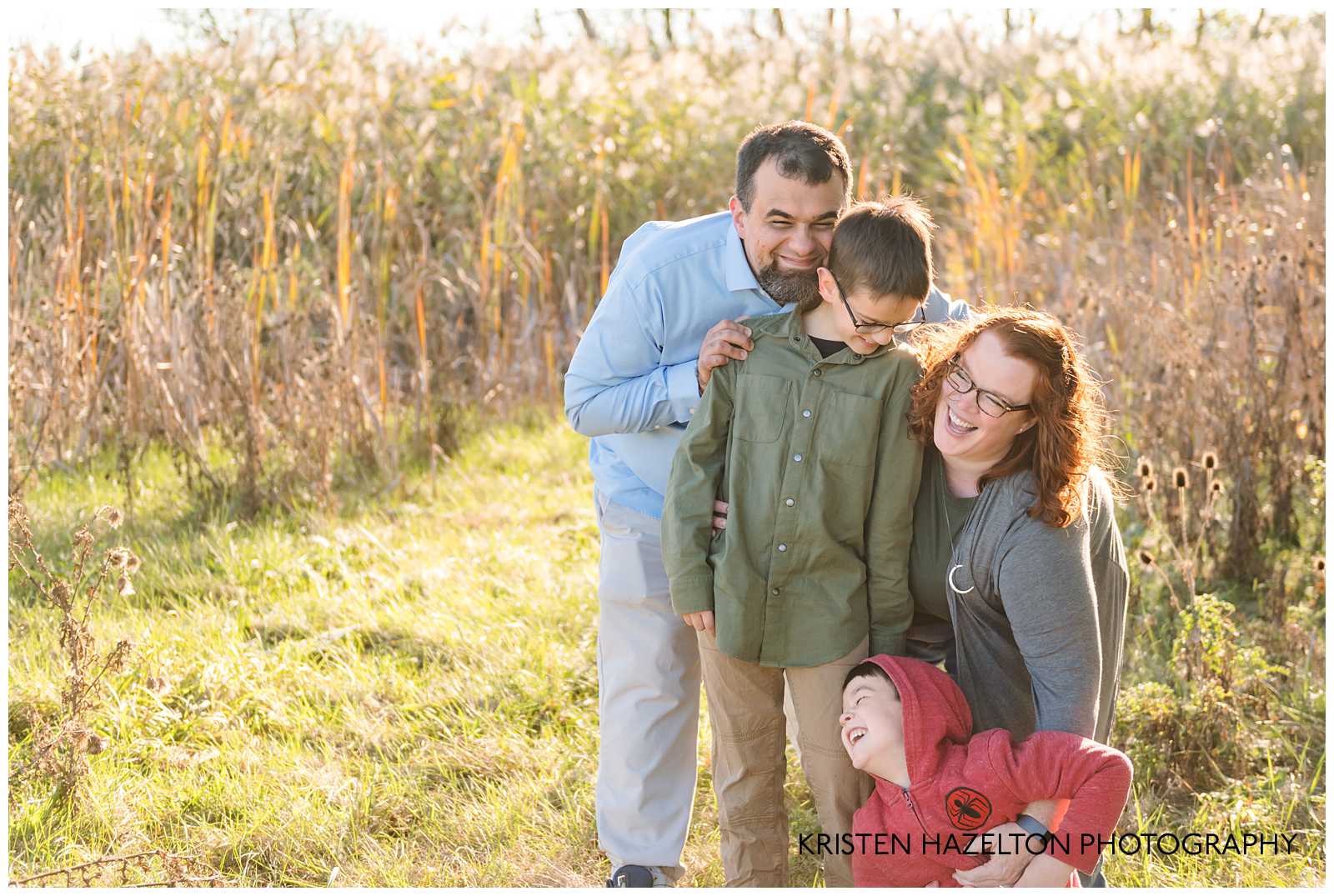 Family of four laughing at by Oak Park, IL and Brookfield IL photographer Kristen Hazelton