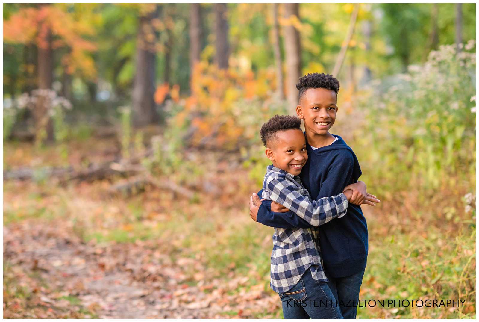 Two young brothers hugging each other at a Oak Park IL Fall Mini Session