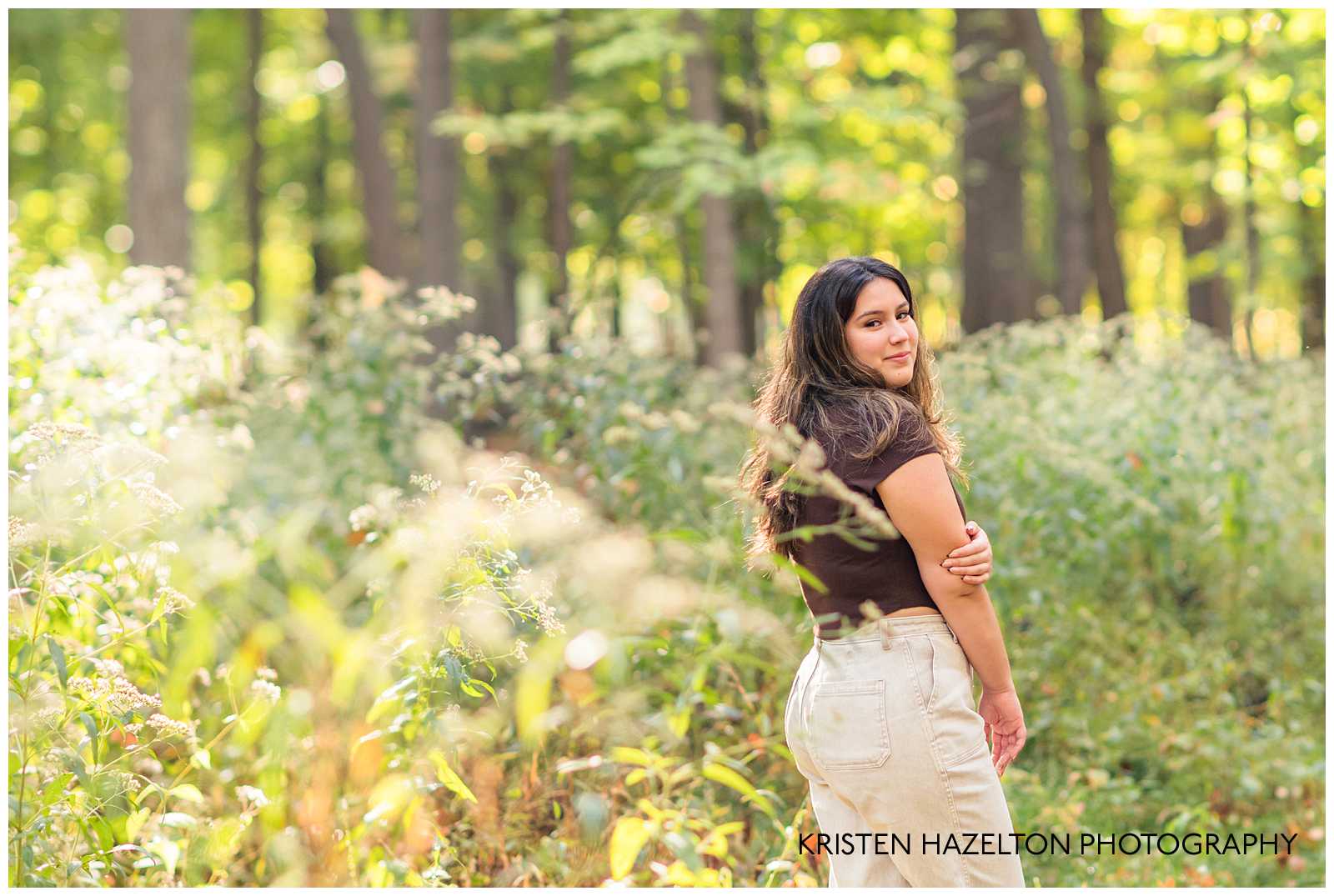 High school senior girl in the sunny woods by River Forest, IL senior photographer Kristen Hazelton