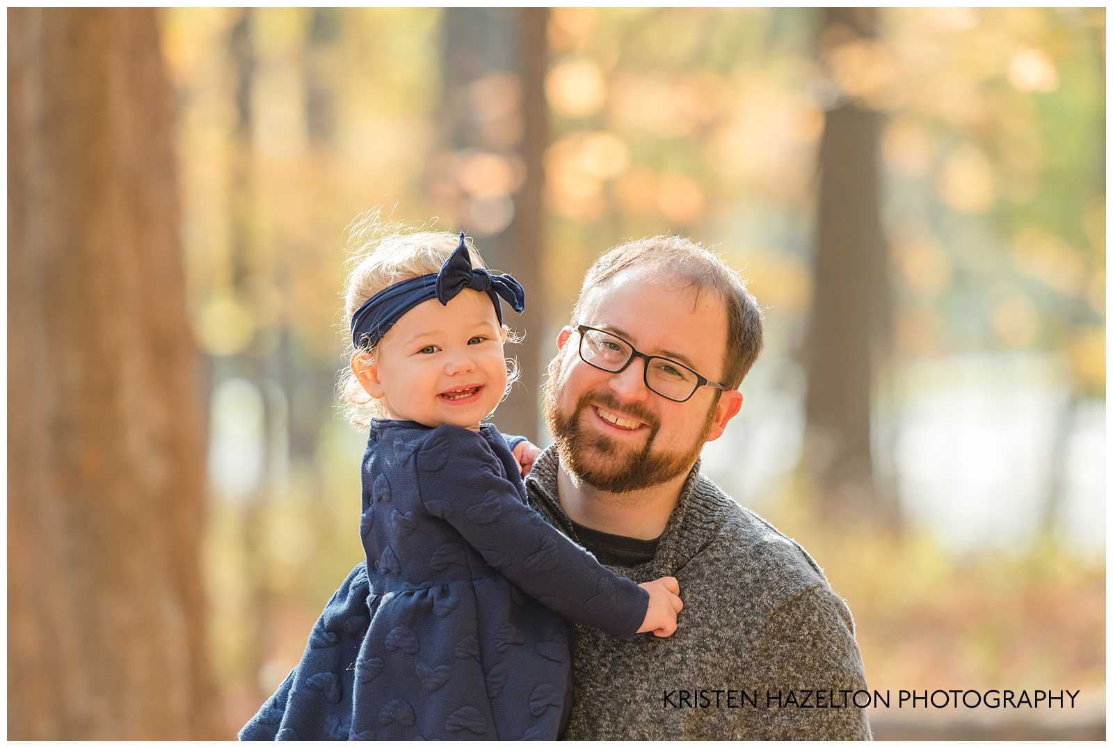 Dad holding his toddler daughter at a Oak Park IL Mini Session
