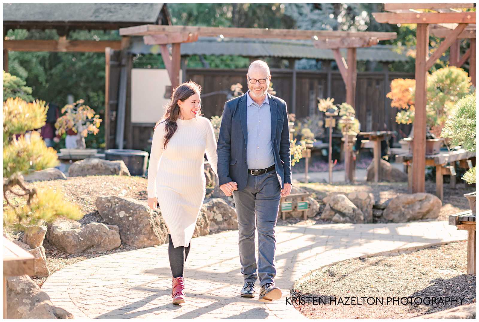 Man and woman walking in the Bonsai Garden at Lake Merritt