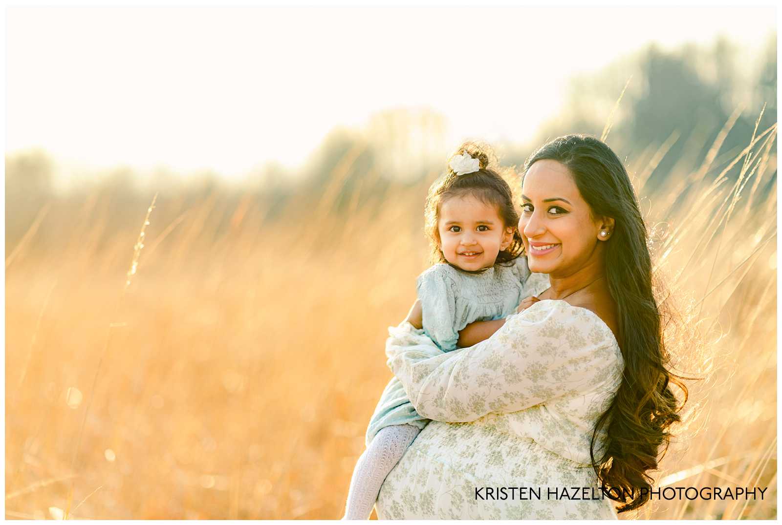 Mom holding her young daughter; Hinsdale maternity photography by Kristen Hazelton