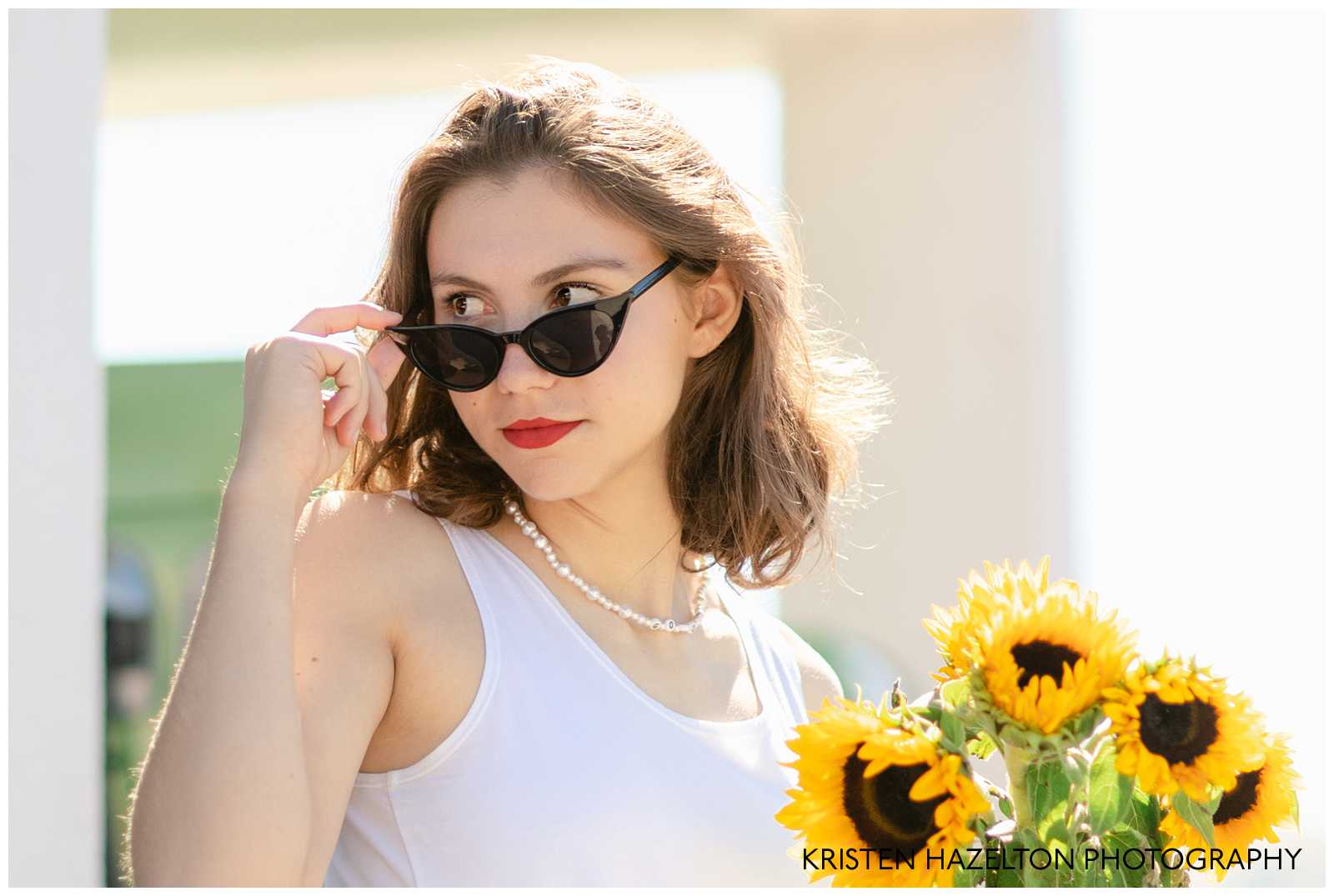 Senior photos with sunglasses and sunflowers by San Jose, CA senior photographer Kristen Hazelton