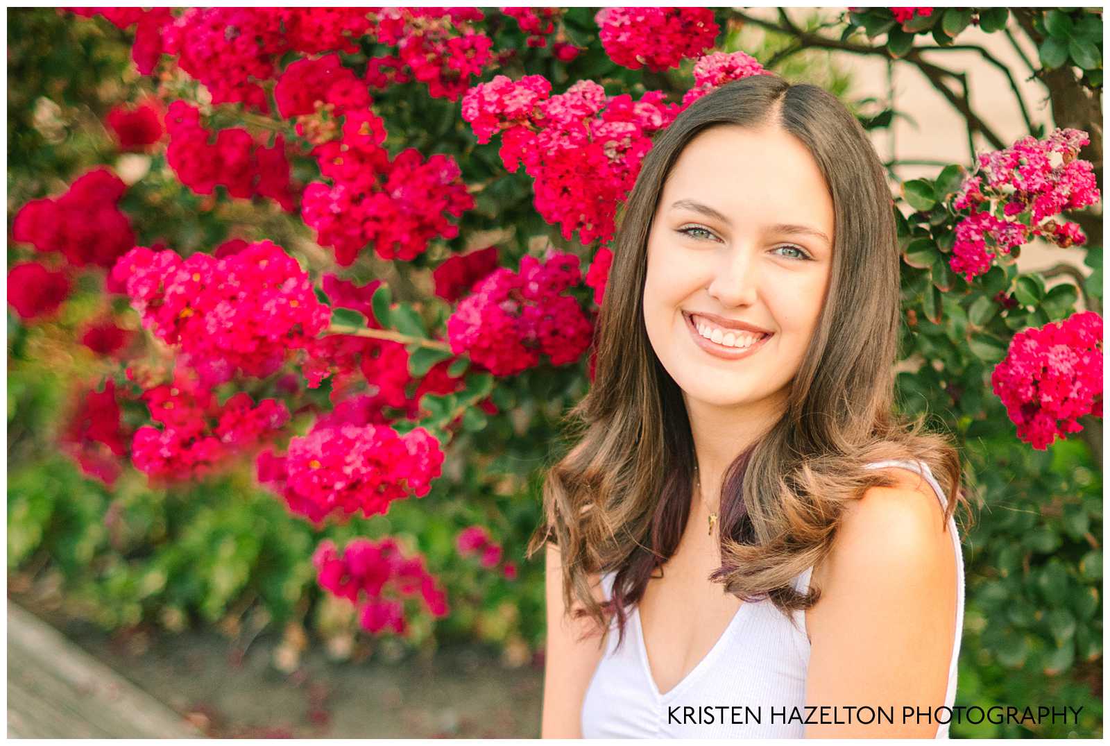 Senior photos with pink crepe myrtle flowers by Pleasanton CA senior photographer Kristen Hazelton