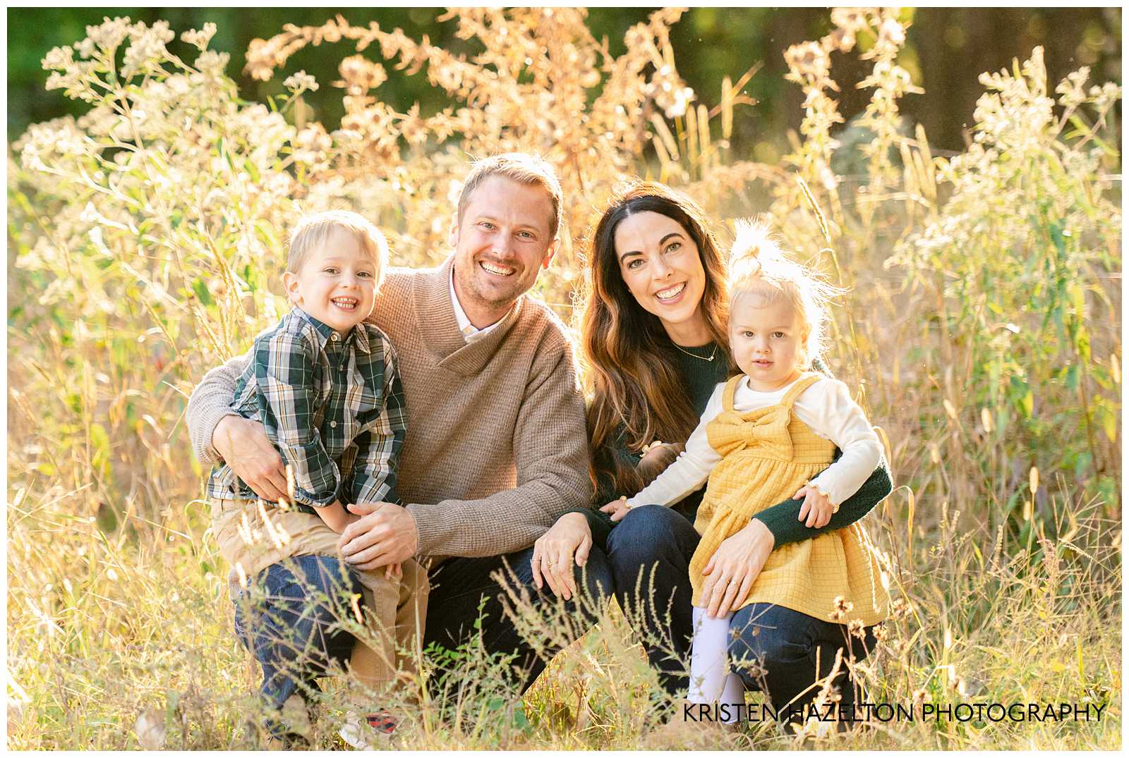 Mom, Dad, and toddler son and daughter in a field of yellow grass and wildflowers by Elmhurst family photographer Kristen Hazelton