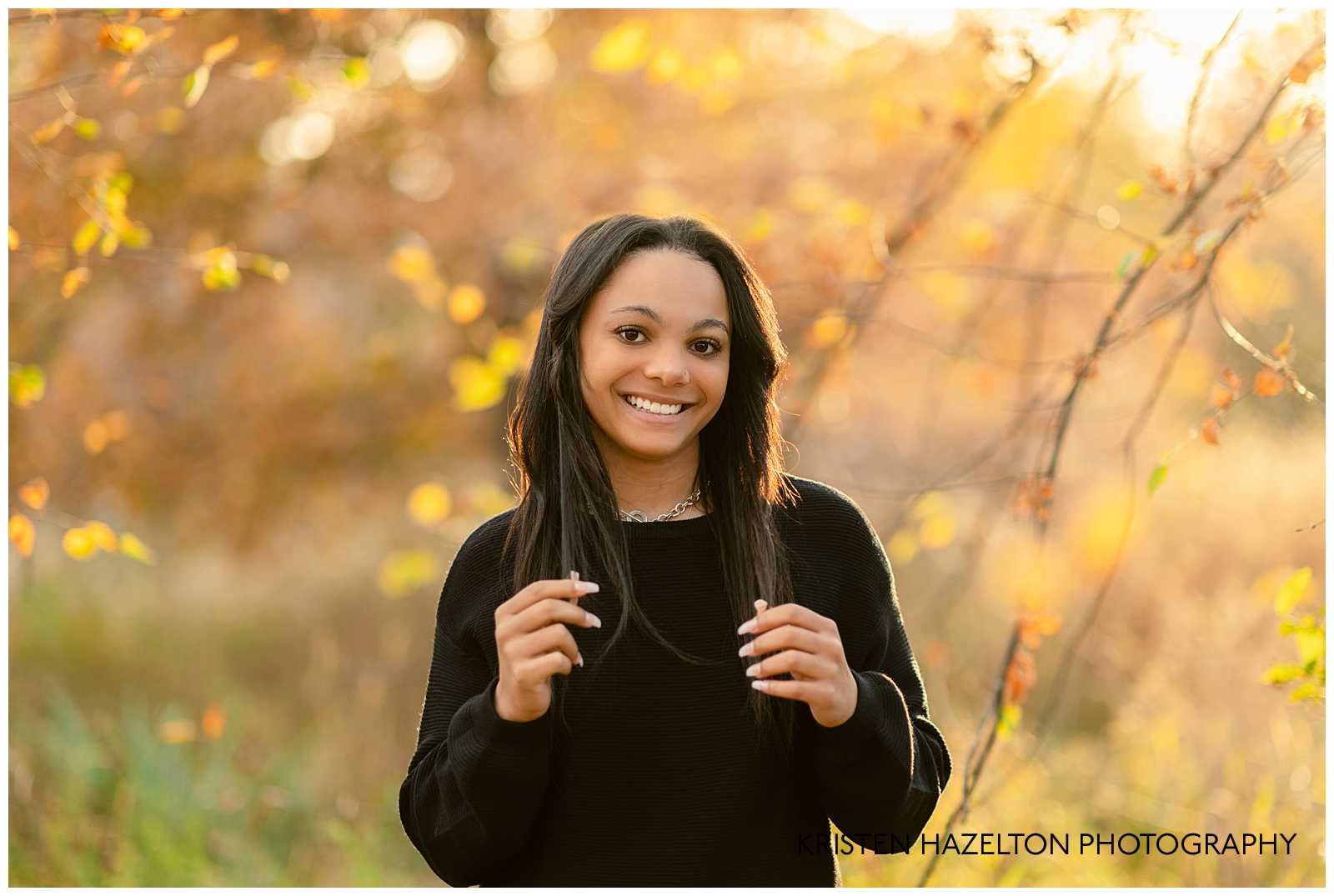 fall OPRF high school senior photos in a grassy meadow by Chicago senior photographer Kristen Hazelton
