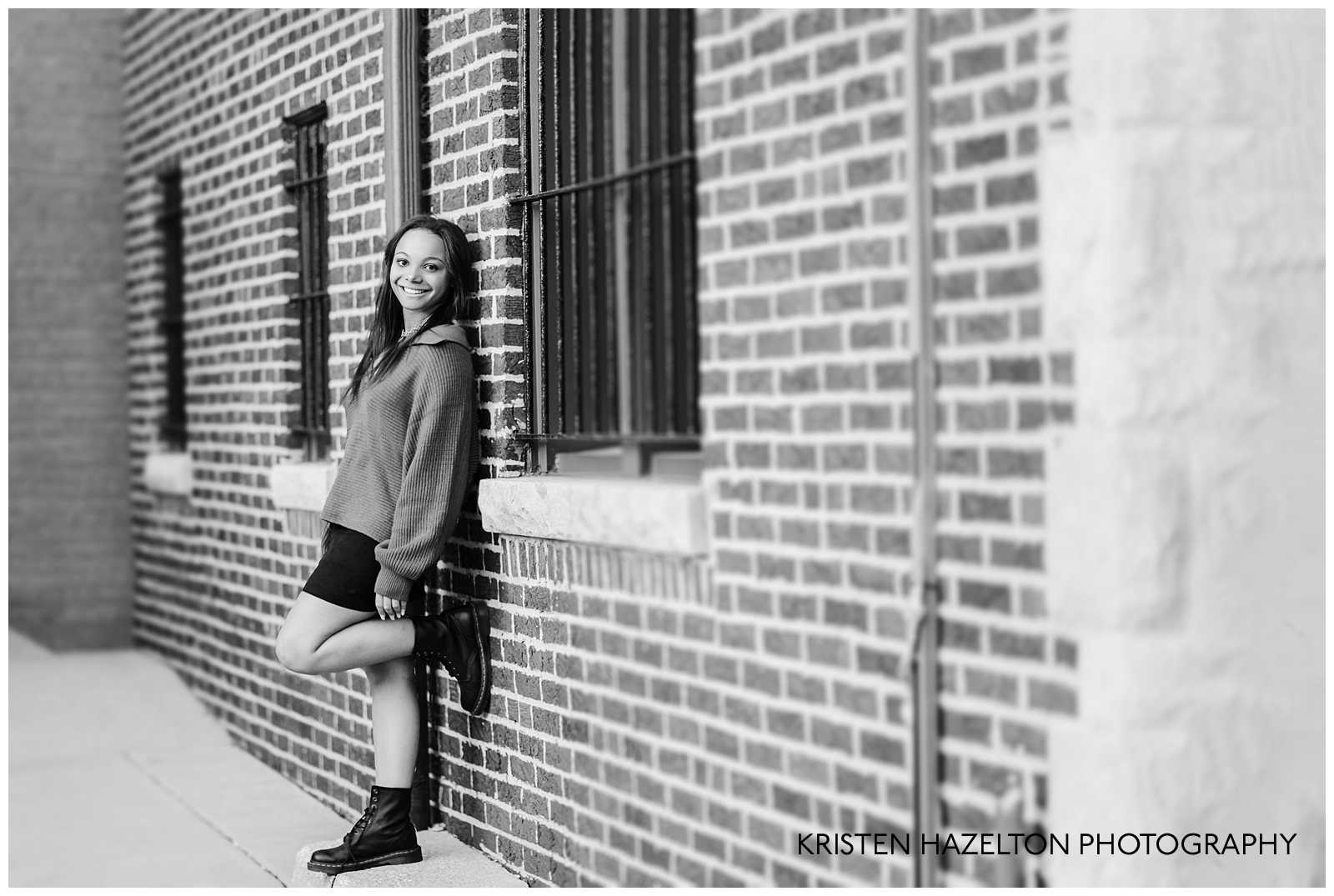 Black and white high school senior photos in a brick alley by Chicago Senior Photographer Kristen Hazelton