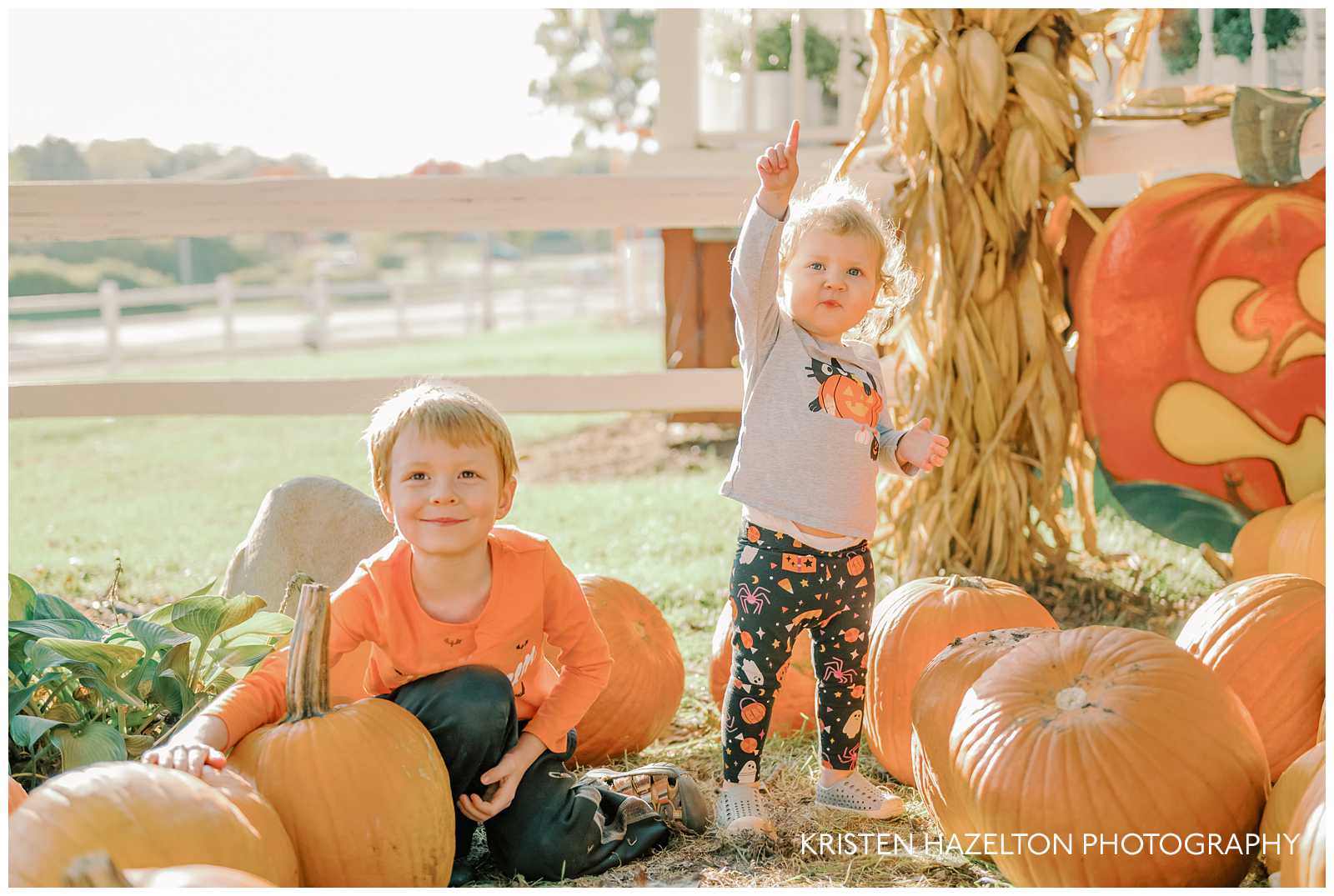 Young boy and toddler girl at a pumpkin patch in Chicago