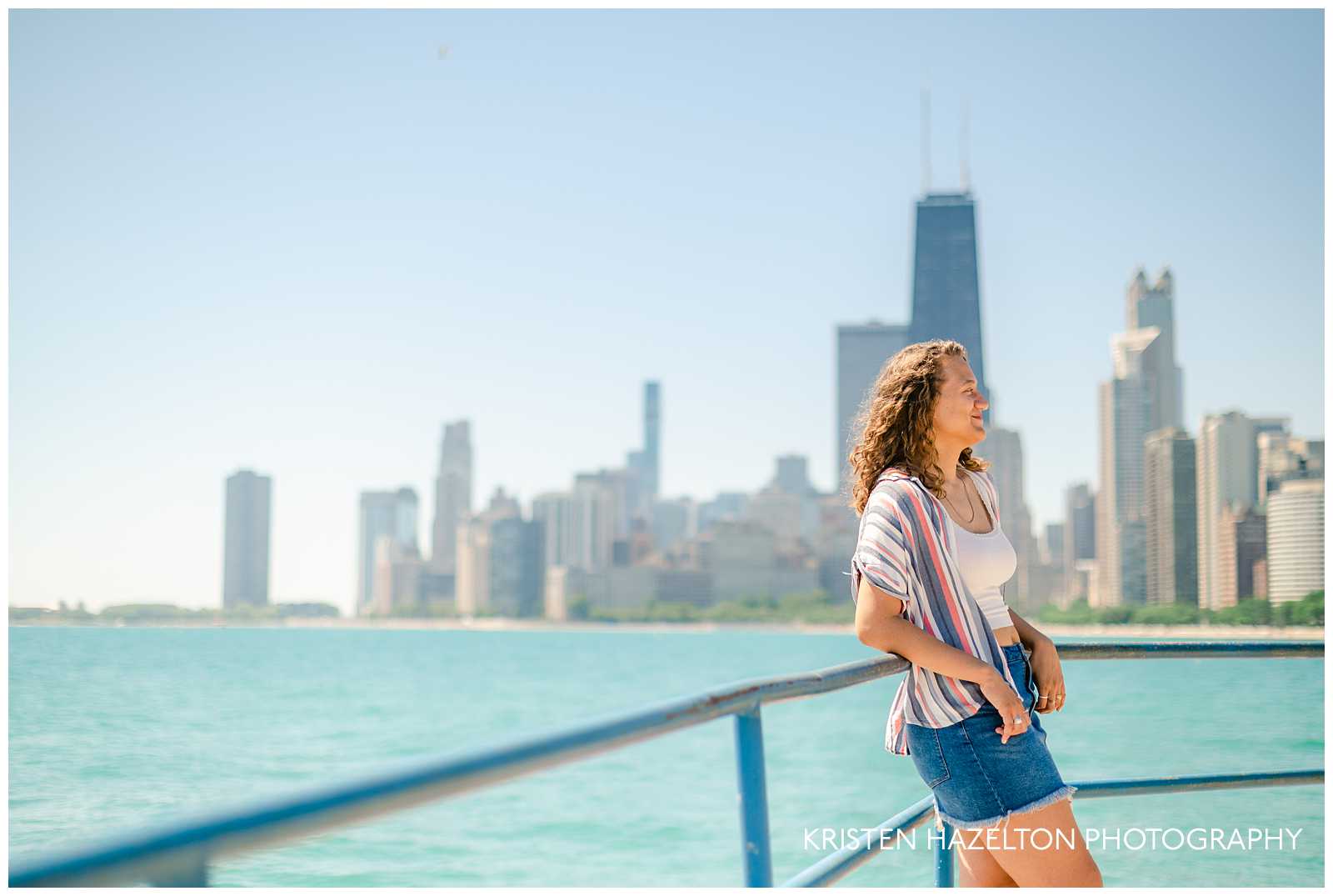 Girl in white tank top and blue miniskirt at North Avenue Beach, one of the best beaches in Chicago