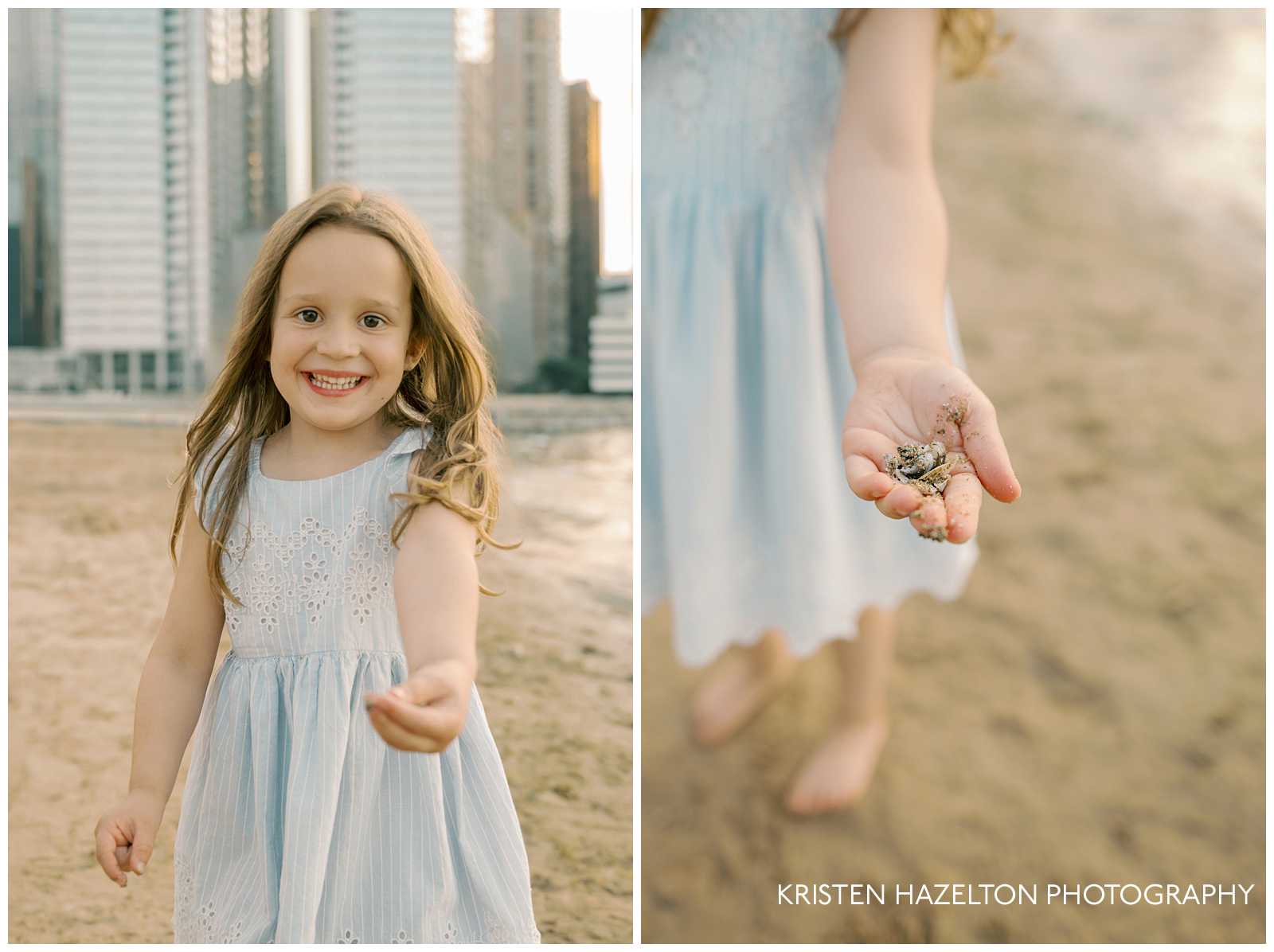 Little girl in a blue sundress at Chicago's Ohio St Beach holding out a handful of shells. Taken as part of her family's beach family photos by Chicago photographer Kristen Hazelton