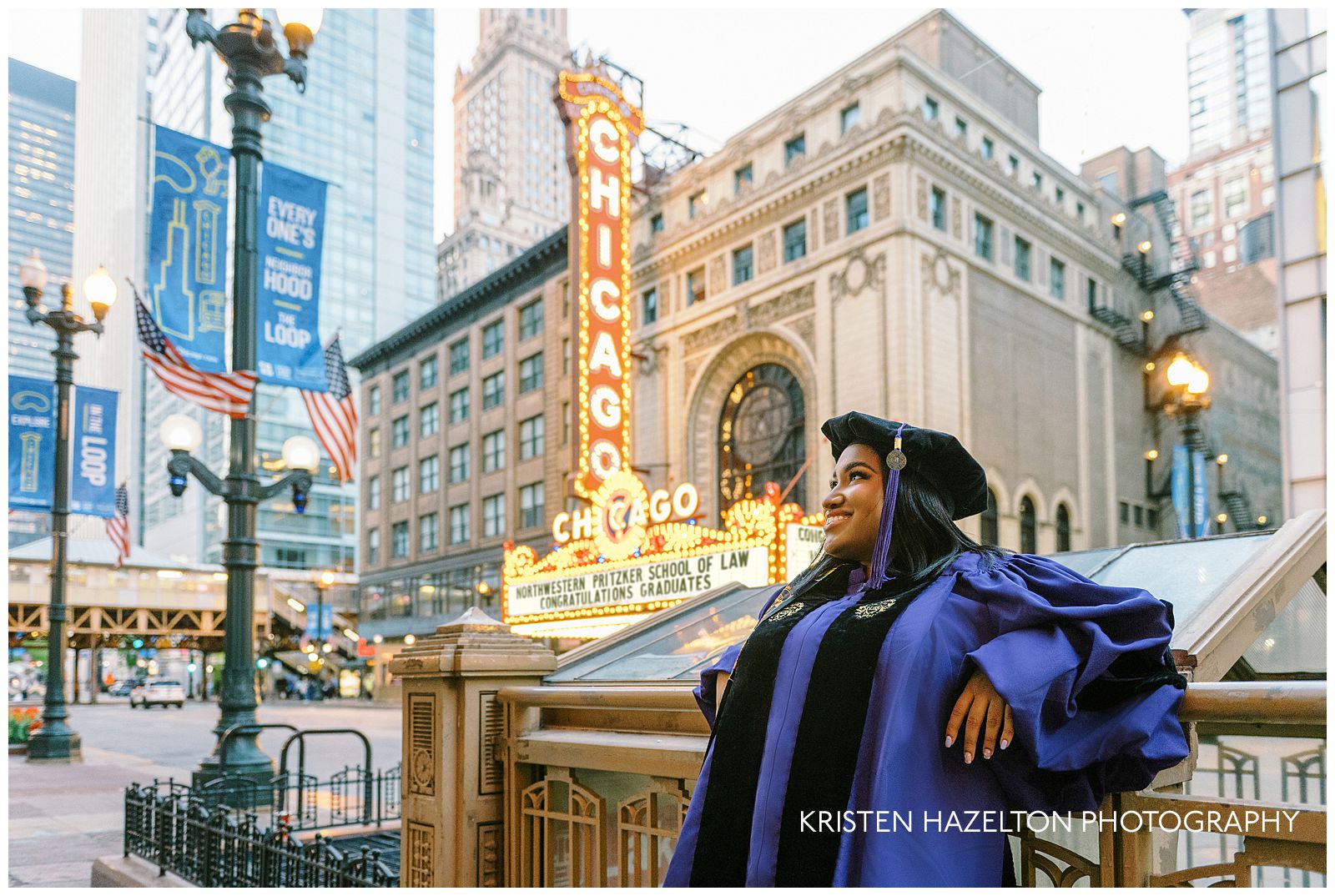 Chicago Theatre photos: a graduate stands in front of the theater marquee
